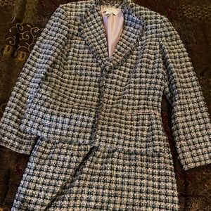 Pink black and white suit